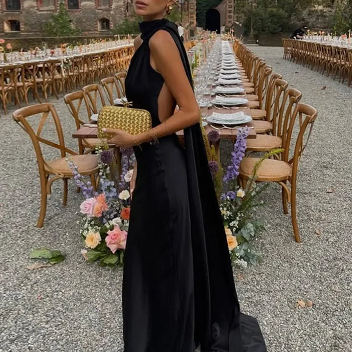 VESTIDO LONGO ELEGANTE EM CETIM,SEM MANGAS, ABERTO NAS COSTAS COM CACHECOL FINO DE AJUSTE