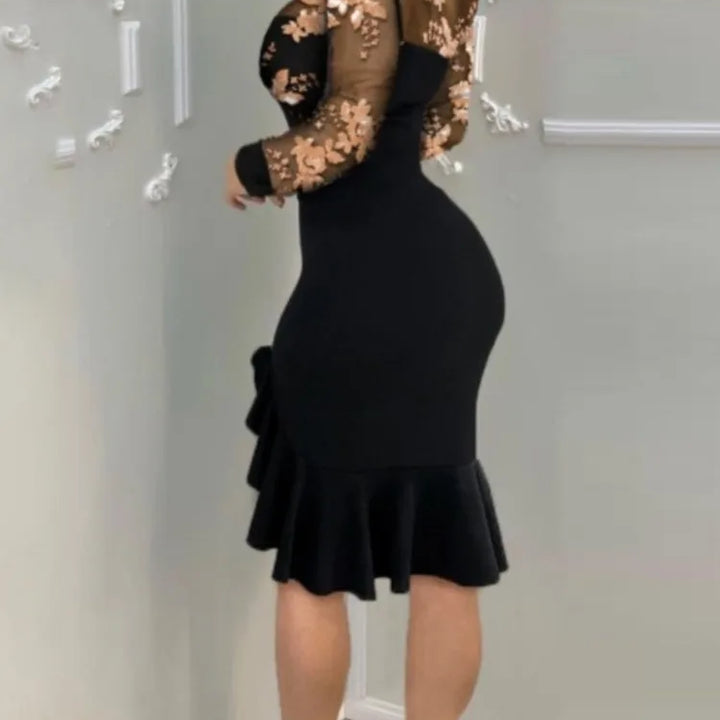 VESTIDO MIDI DE MALHA COM BABADOS E MANGA COMPRIDA