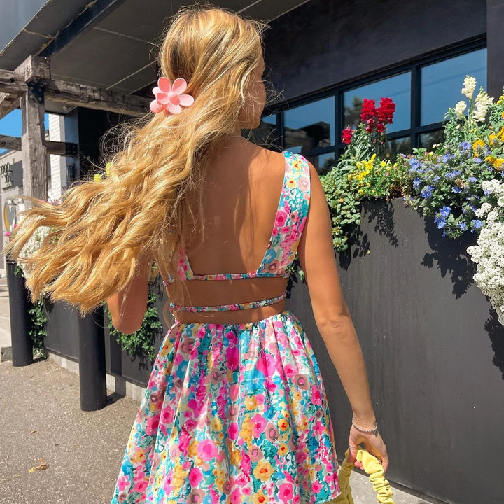 MINI VESTIDO SEXY,COM ABERTURA NAS COSTAS EM DECOTE EM V E COM ESTAMPA DE FLORES