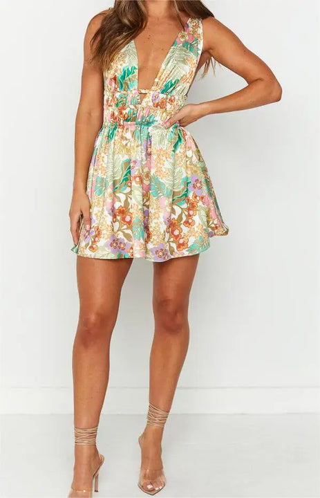 MINI VESTIDO SEXY,COM ABERTURA NAS COSTAS EM DECOTE EM V E COM ESTAMPA DE FLORES