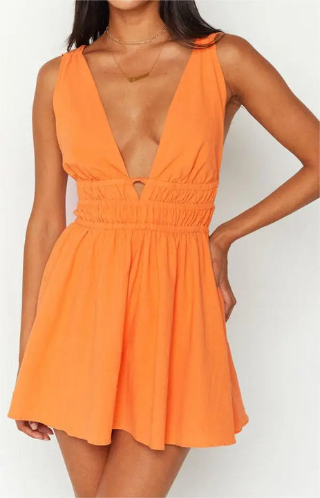 MINI VESTIDO SEXY,COM ABERTURA NAS COSTAS EM DECOTE EM V E COM ESTAMPA DE FLORES