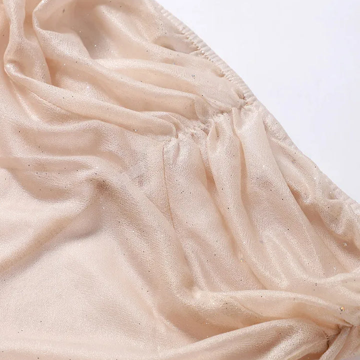 VESTIDO LONGO DE LANTEJOULAS TRANSPARENTES