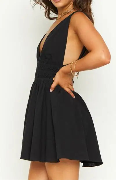 MINI VESTIDO SEXY,COM ABERTURA NAS COSTAS EM DECOTE EM V E COM ESTAMPA DE FLORES