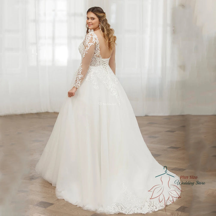 VESTIDO DE NOIVA DE RENDA COM MANGA COMPRIDA E COM DECOTE EM V DE PASTROL