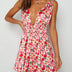 MINI VESTIDO SEXY,COM ABERTURA NAS COSTAS EM DECOTE EM V E COM ESTAMPA DE FLORES