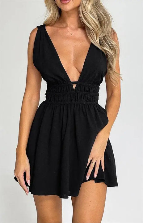 MINI VESTIDO SEXY,COM ABERTURA NAS COSTAS EM DECOTE EM V E COM ESTAMPA DE FLORES