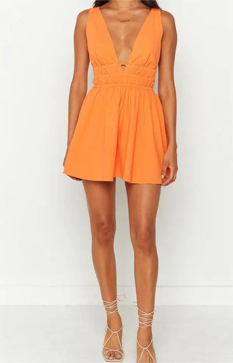 MINI VESTIDO SEXY,COM ABERTURA NAS COSTAS EM DECOTE EM V E COM ESTAMPA DE FLORES