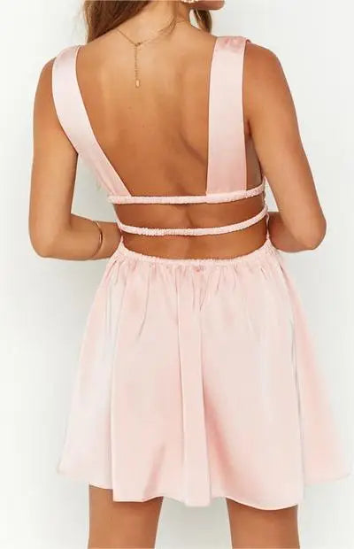 MINI VESTIDO SEXY,COM ABERTURA NAS COSTAS EM DECOTE EM V E COM ESTAMPA DE FLORES